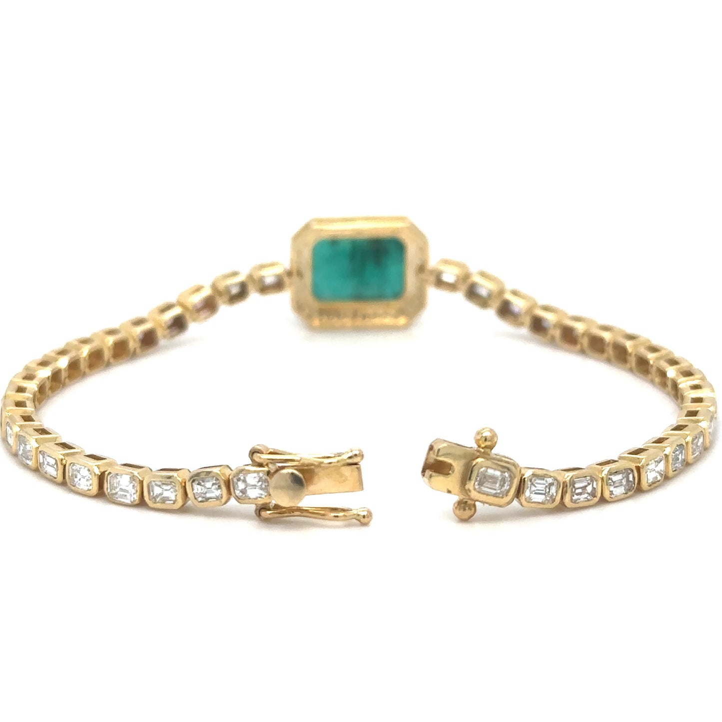 18KT YELLOW GOLD EMERALD OCT AND DIAMONDS TENNIS BRACELET