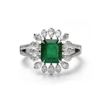 18KT WHITE GOLD EMERALD AND DIAMONDS RING