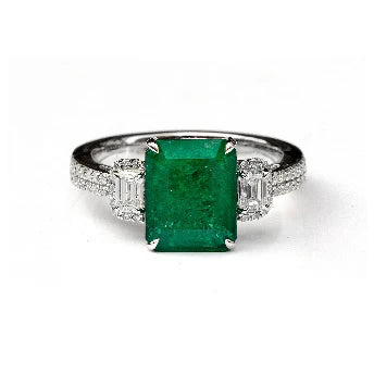 18KT WHITE GOLD EMERALD AND DIAMONDS RING