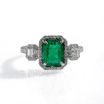 18KT WHITE GOLD EMERALD AND DIAMONDS RING