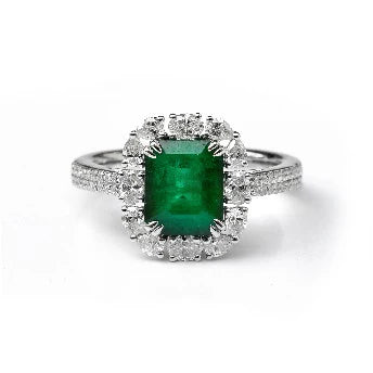 18KT WHITE GOLD EMERALD AND DIAMONDS RING