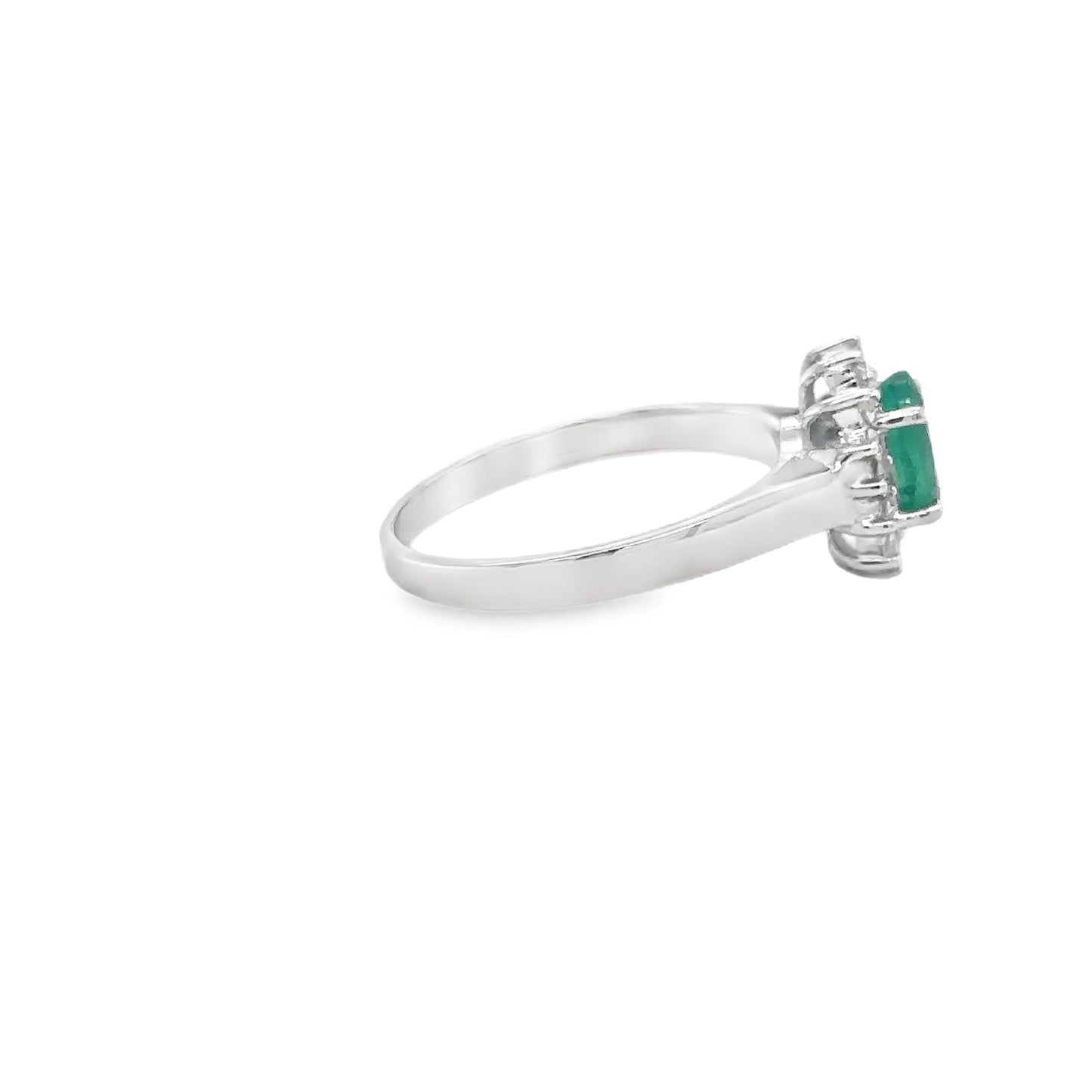 18KT WHITE GOLD EMERALD AND DIAMONDS RING