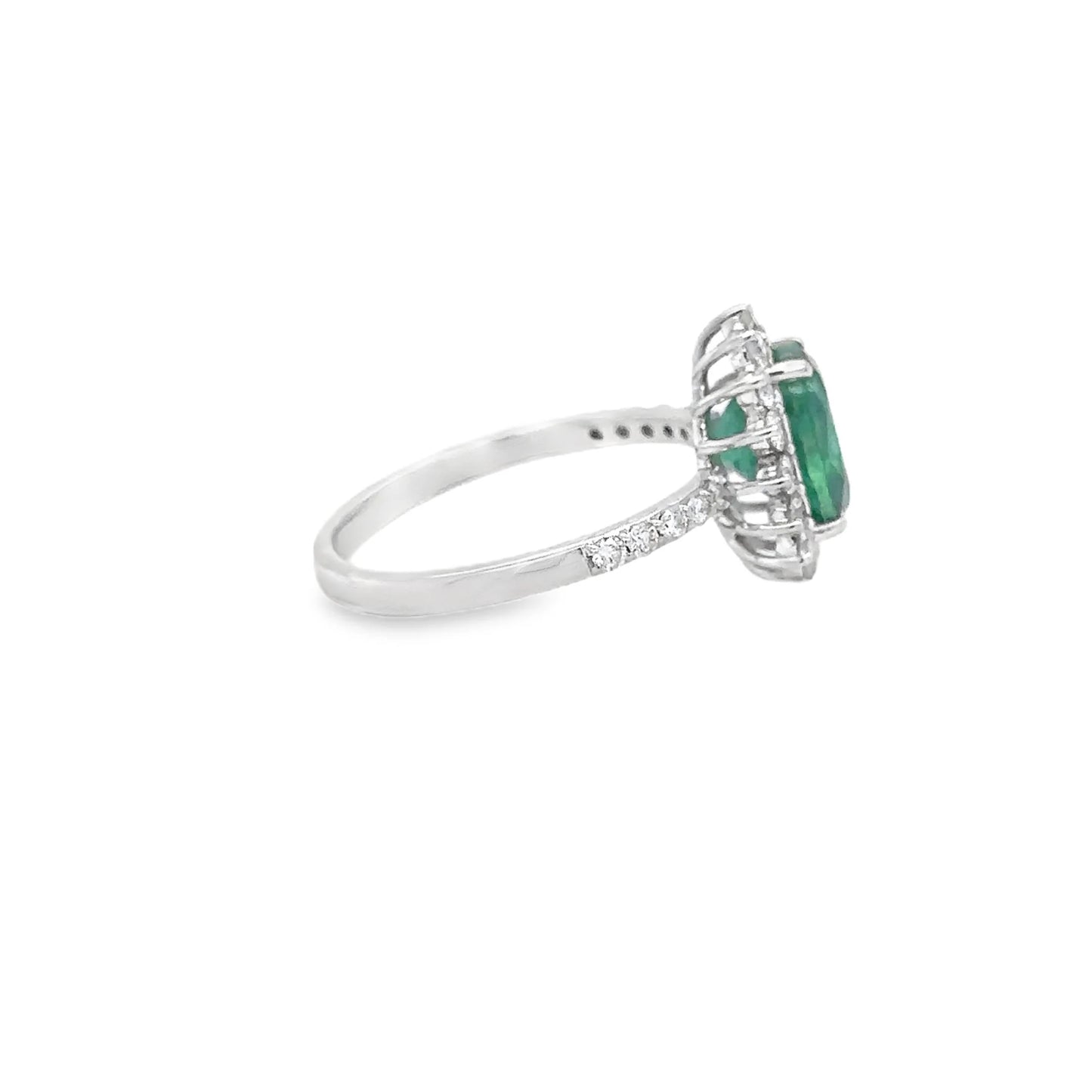 18KT WHITE GOLD EMERALD AND DIAMONDS RING