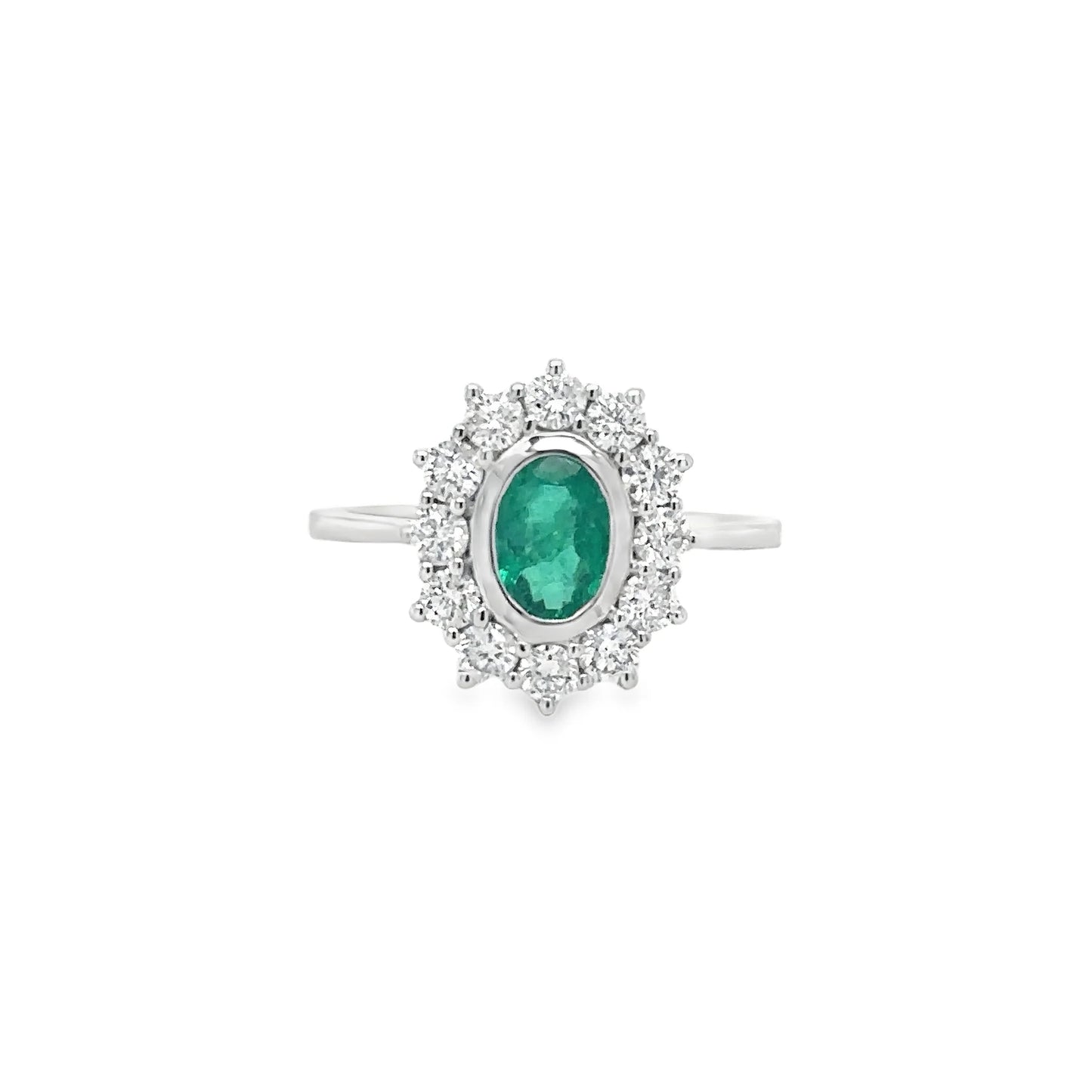 18KT WHITE GOLD EMERALD AND DIAMONDS RING