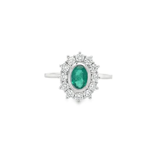 18KT WHITE GOLD EMERALD AND DIAMONDS RING