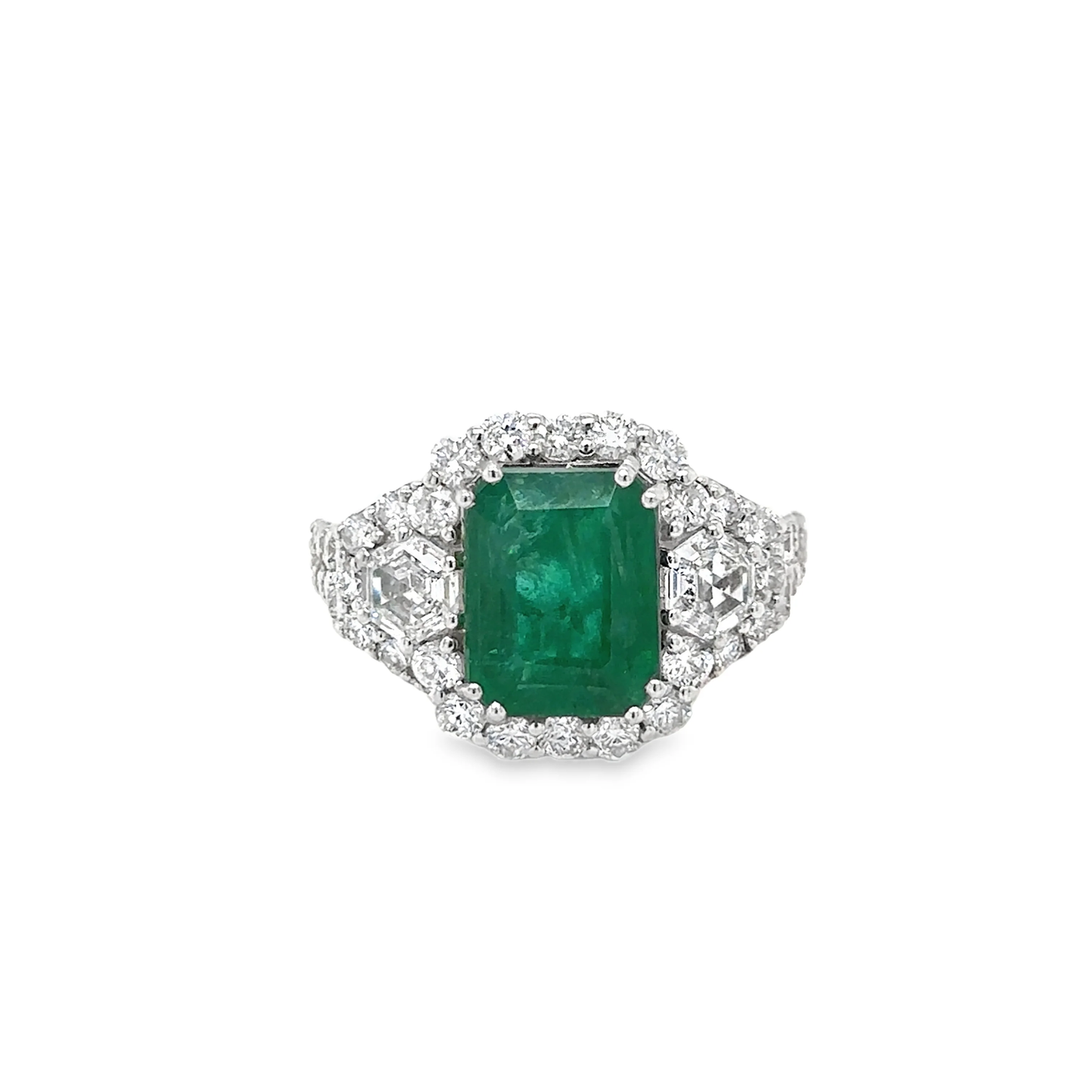 18KT WHITE GOLD EMERALD AND DIAMONDS RING