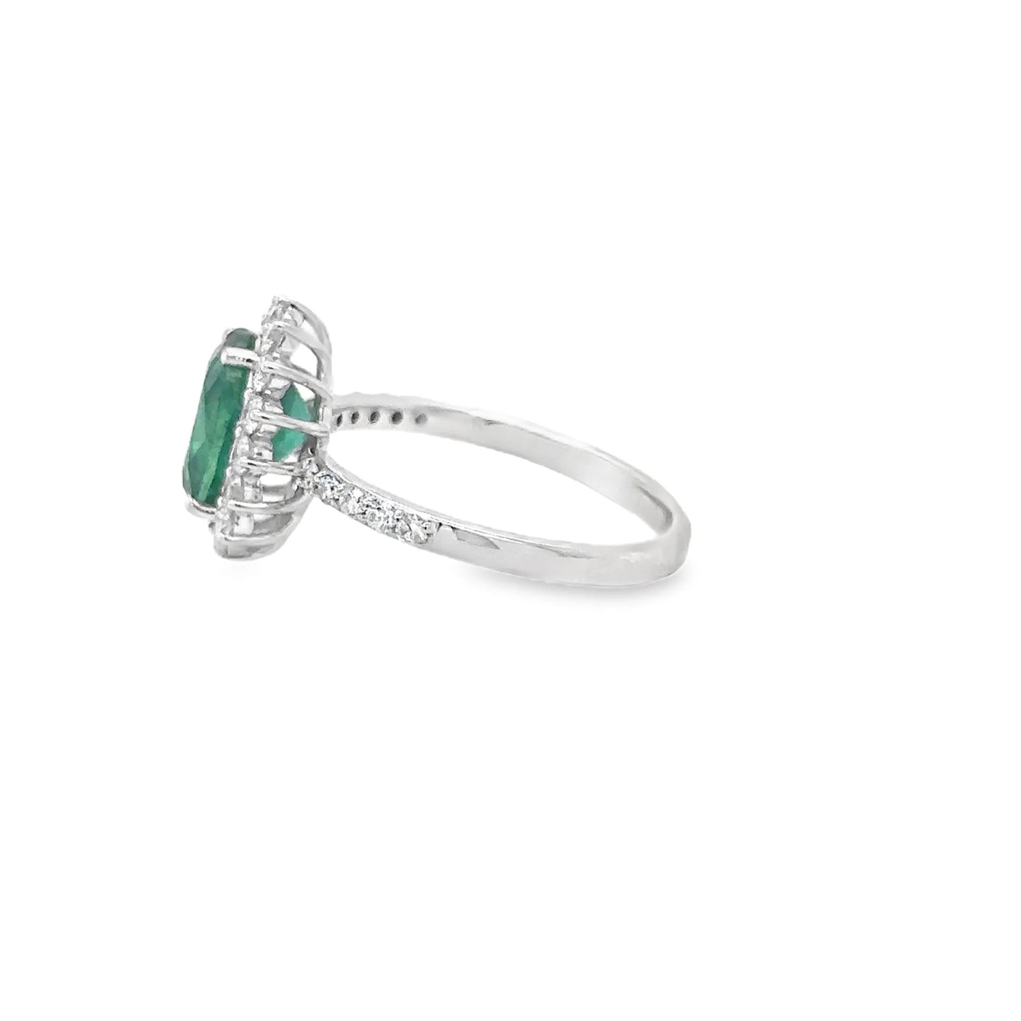 18KT WHITE GOLD EMERALD AND DIAMONDS RING