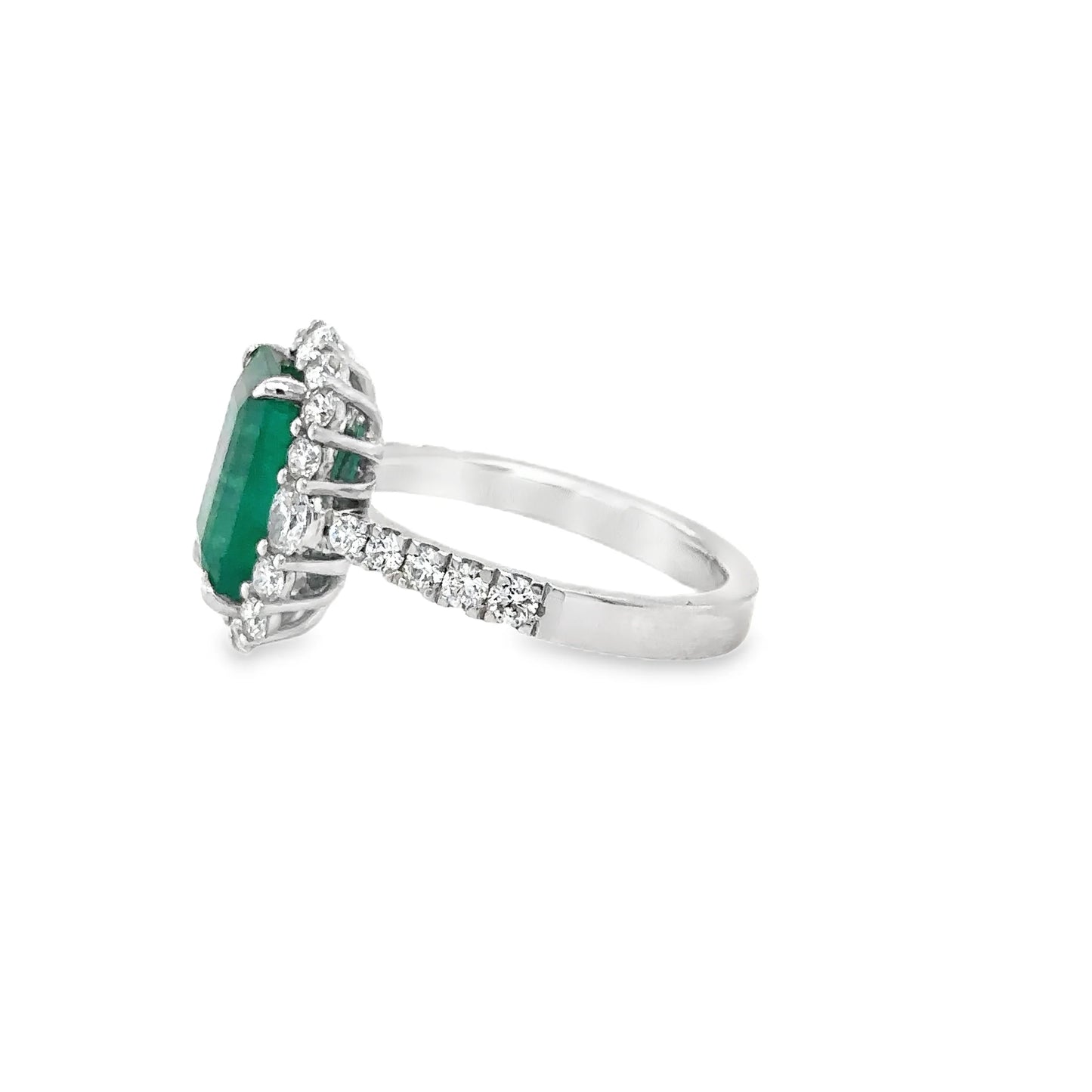 18KT WHITE GOLD EMERALD AND DIAMONDS RING