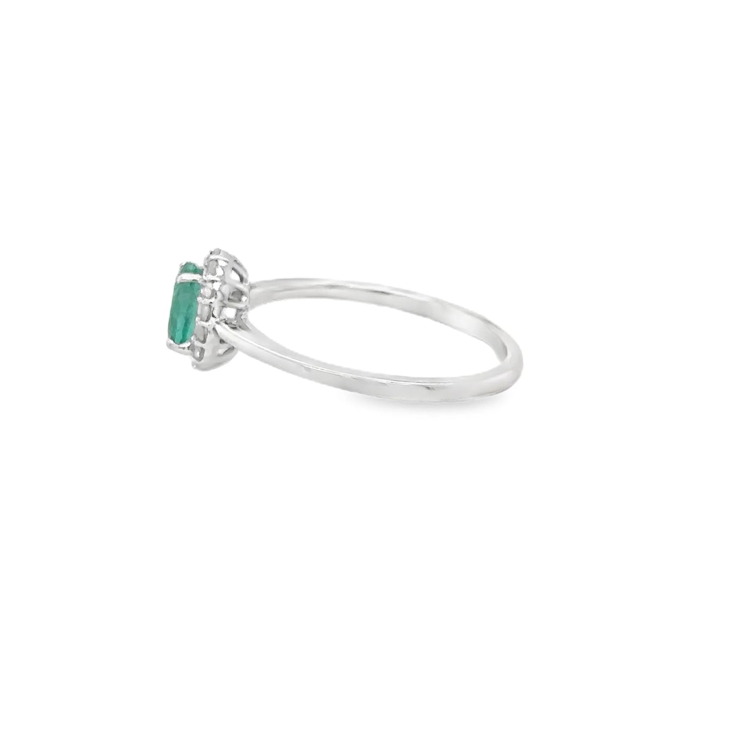 18KT WHITE GOLD EMERALD AND DIAMONDS RING
