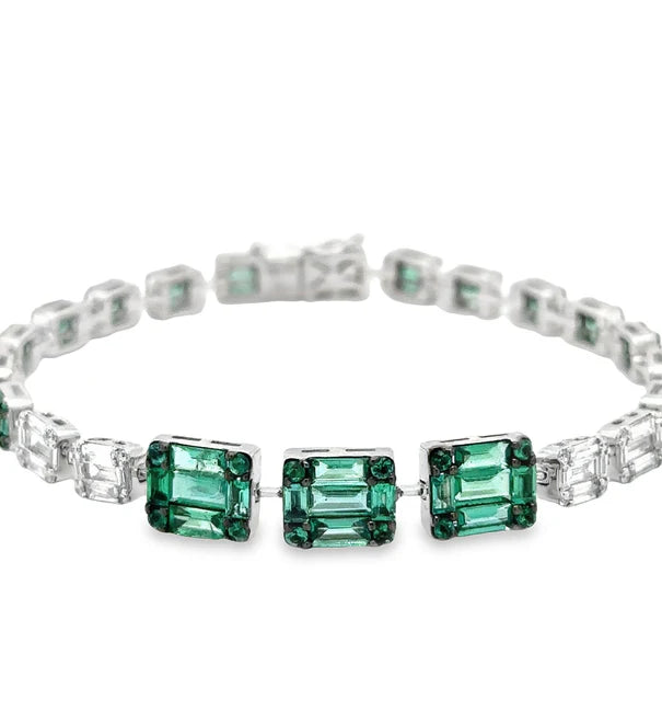 18KT WHITE GOLD EMERALD AND DIAMONDS TENNIS BRACELET