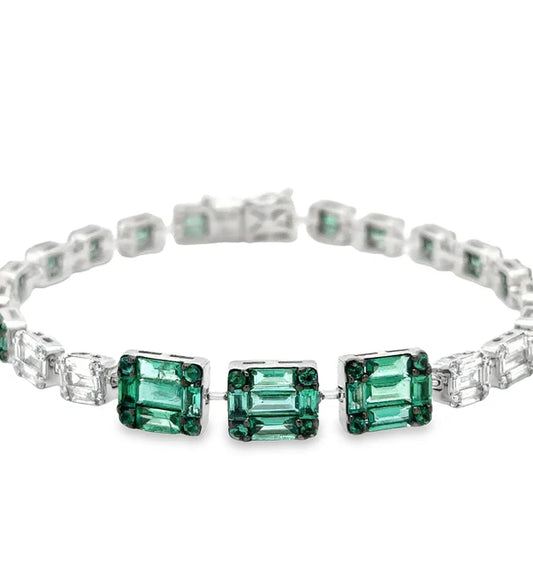 18KT WHITE GOLD EMERALD AND DIAMONDS TENNIS BRACELET
