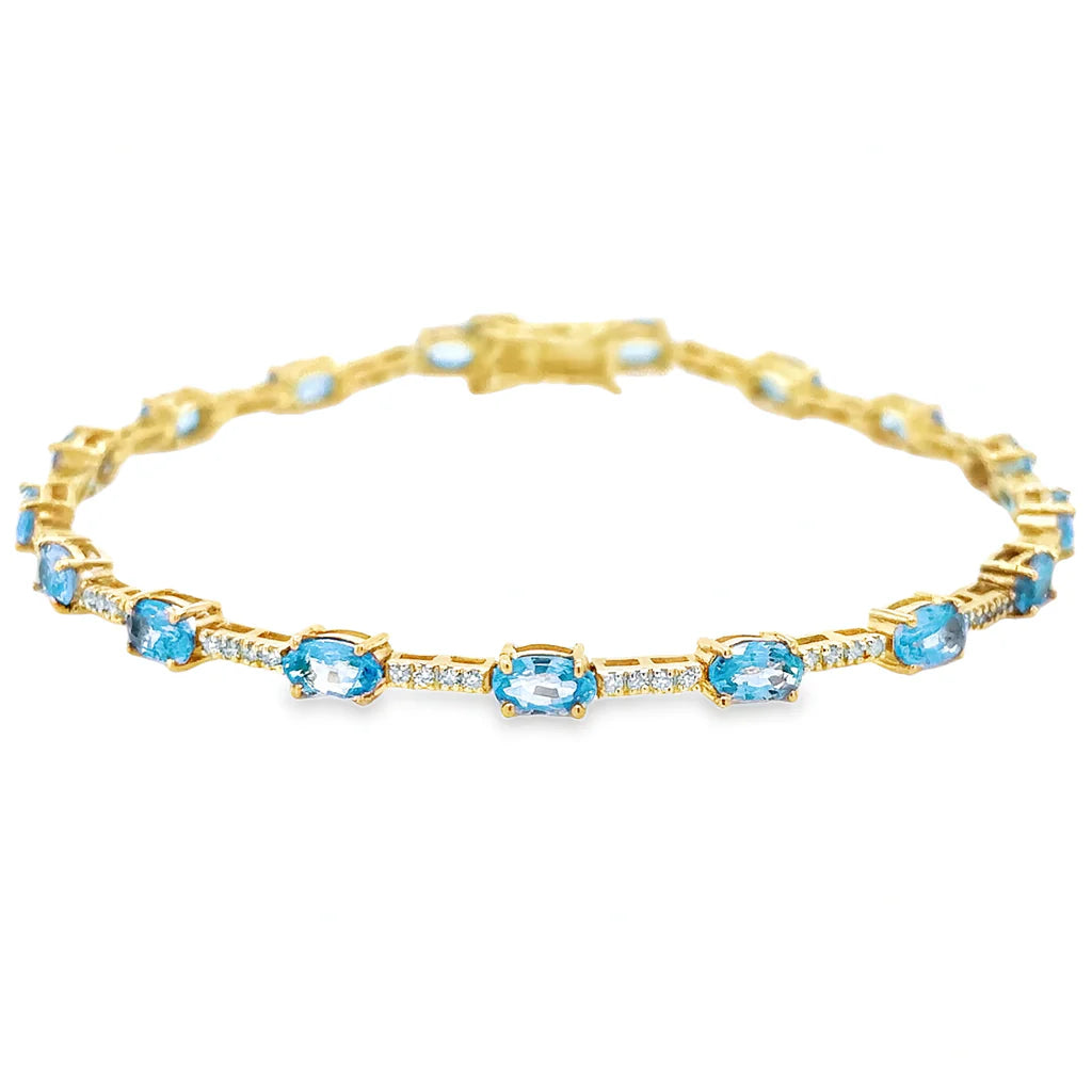 14KT GOLD BLUE TOPAZ AND DIAMONDS BRACELET