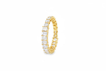 14KT GOLD ROUND AND EMERALD CUT DIAMOND RING