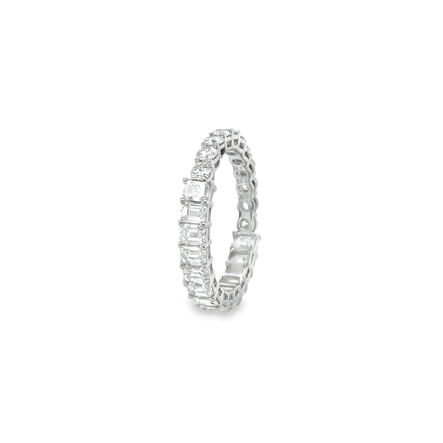 14KT GOLD ROUND AND EMERALD CUT DIAMOND RING