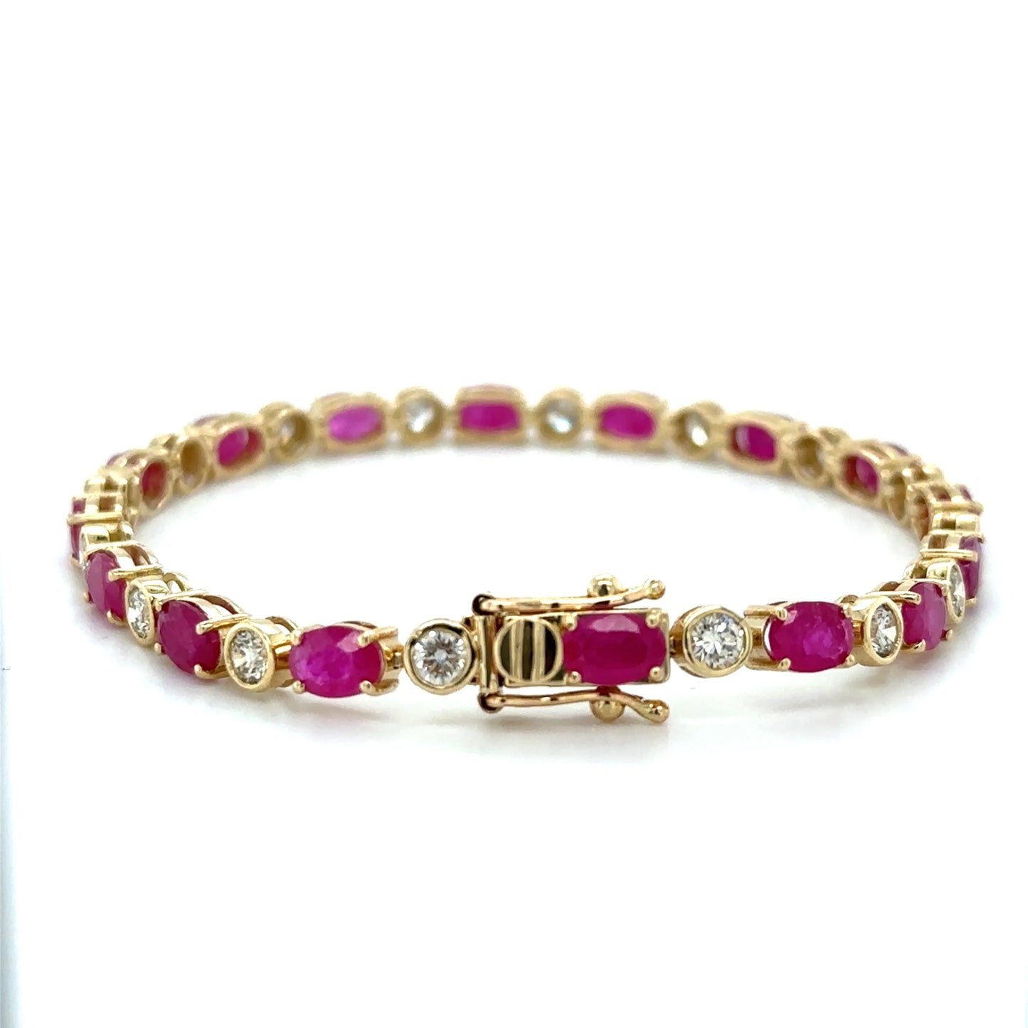 14KT YELLOW GOLD RUBY AND DIAMONDS BRACELET