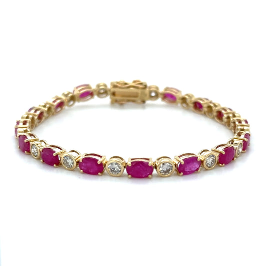 14KT YELLOW GOLD RUBY AND DIAMONDS BRACELET