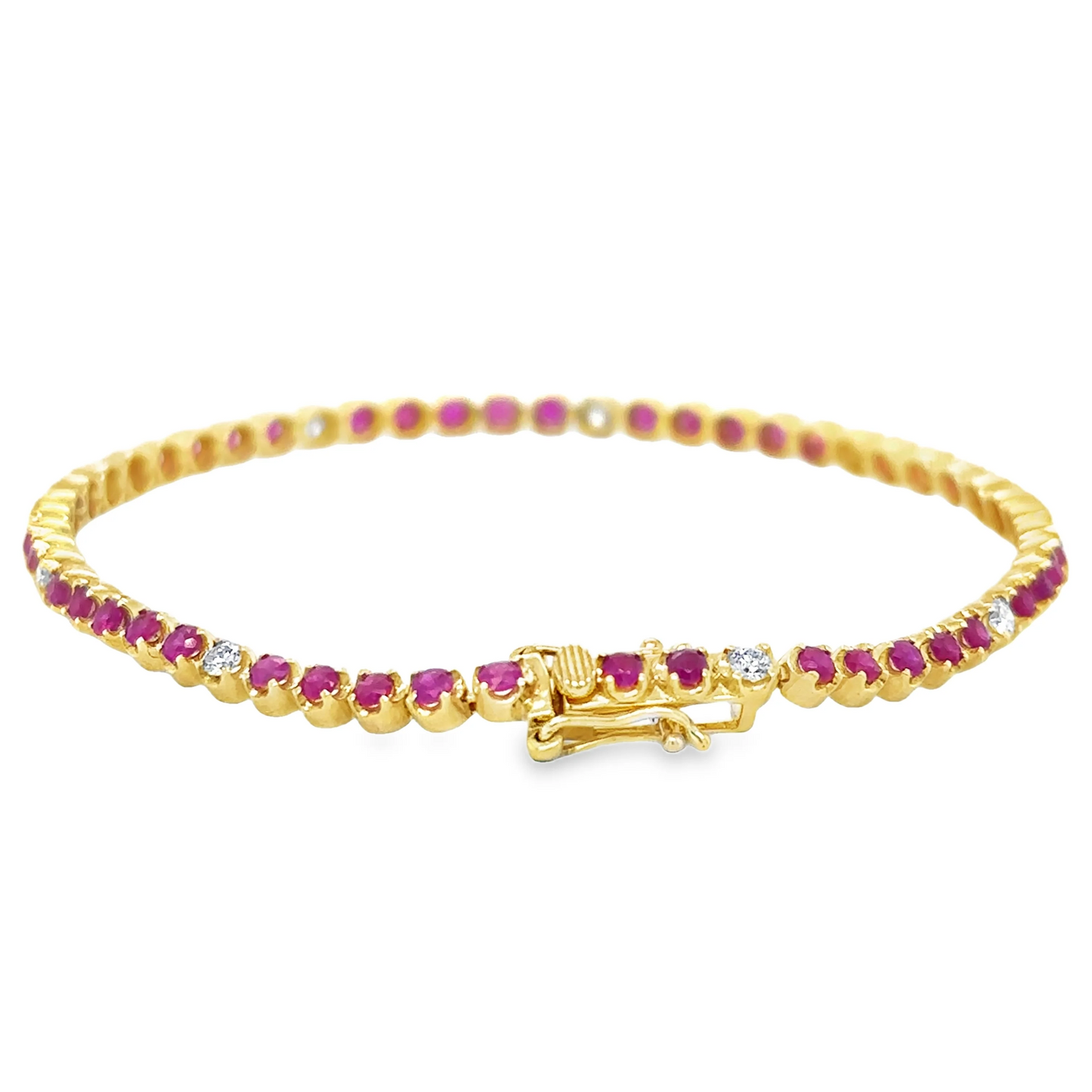 14KT GOLD DIAMOND AND RUBY BRACELET