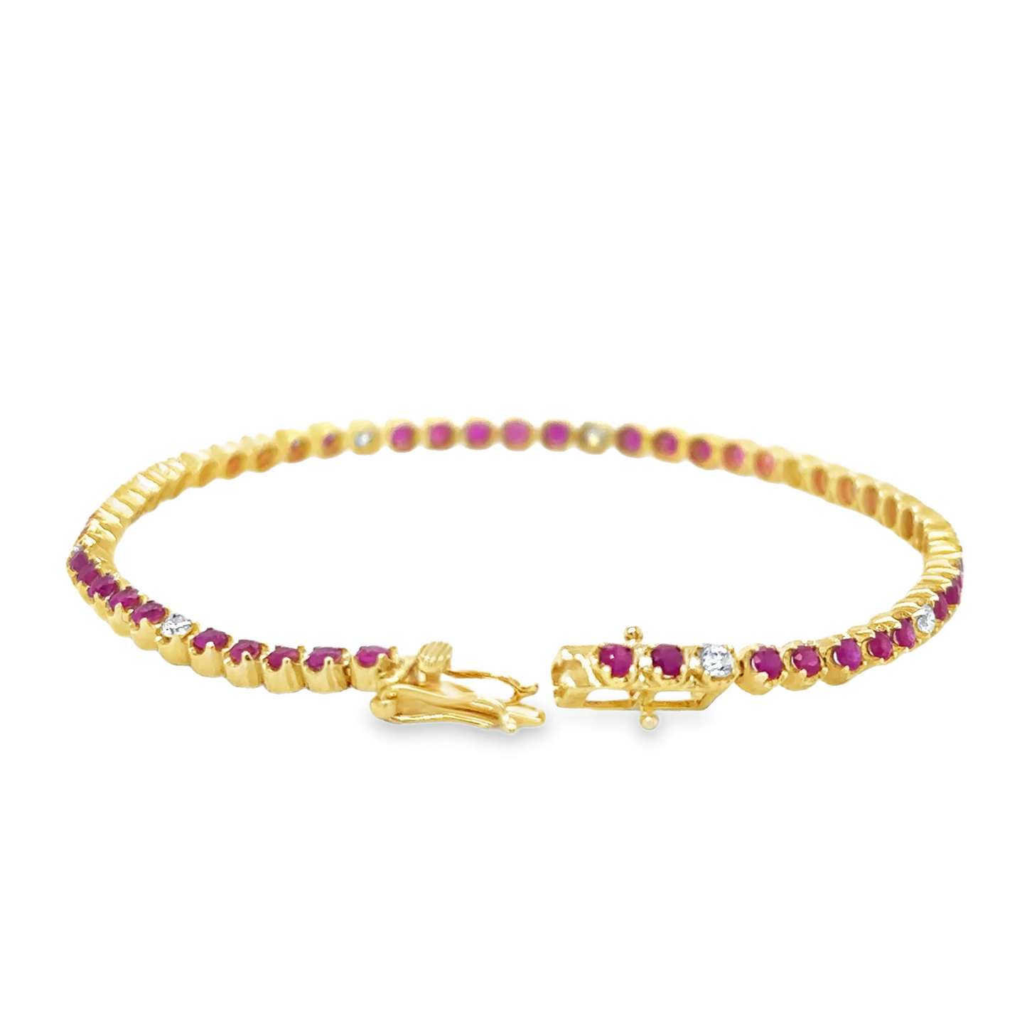 14KT GOLD DIAMOND AND RUBY BRACELET