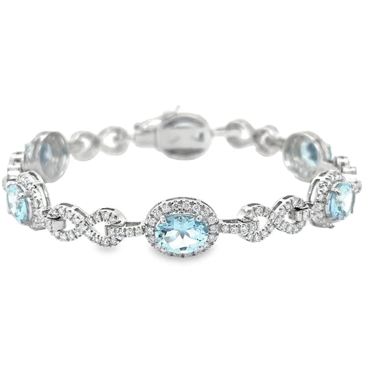 14KT WHITE GOLD AQUAMARINE AND DIAMONDS TENNIS BRACELET