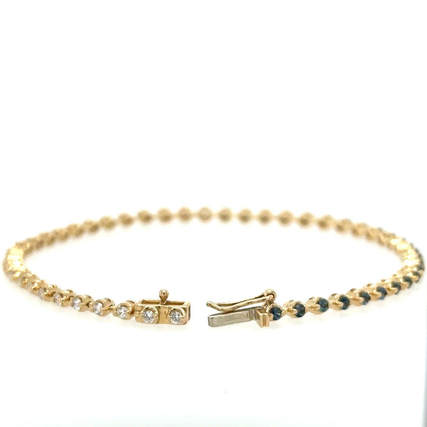 14KT YELLOW GOLD DIAMONDS AND BLUE SAPPHIRE TENNIS BRACELET