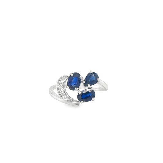 18KT GOLD BLUE SAPPHIRE AND DIAMONDS RING