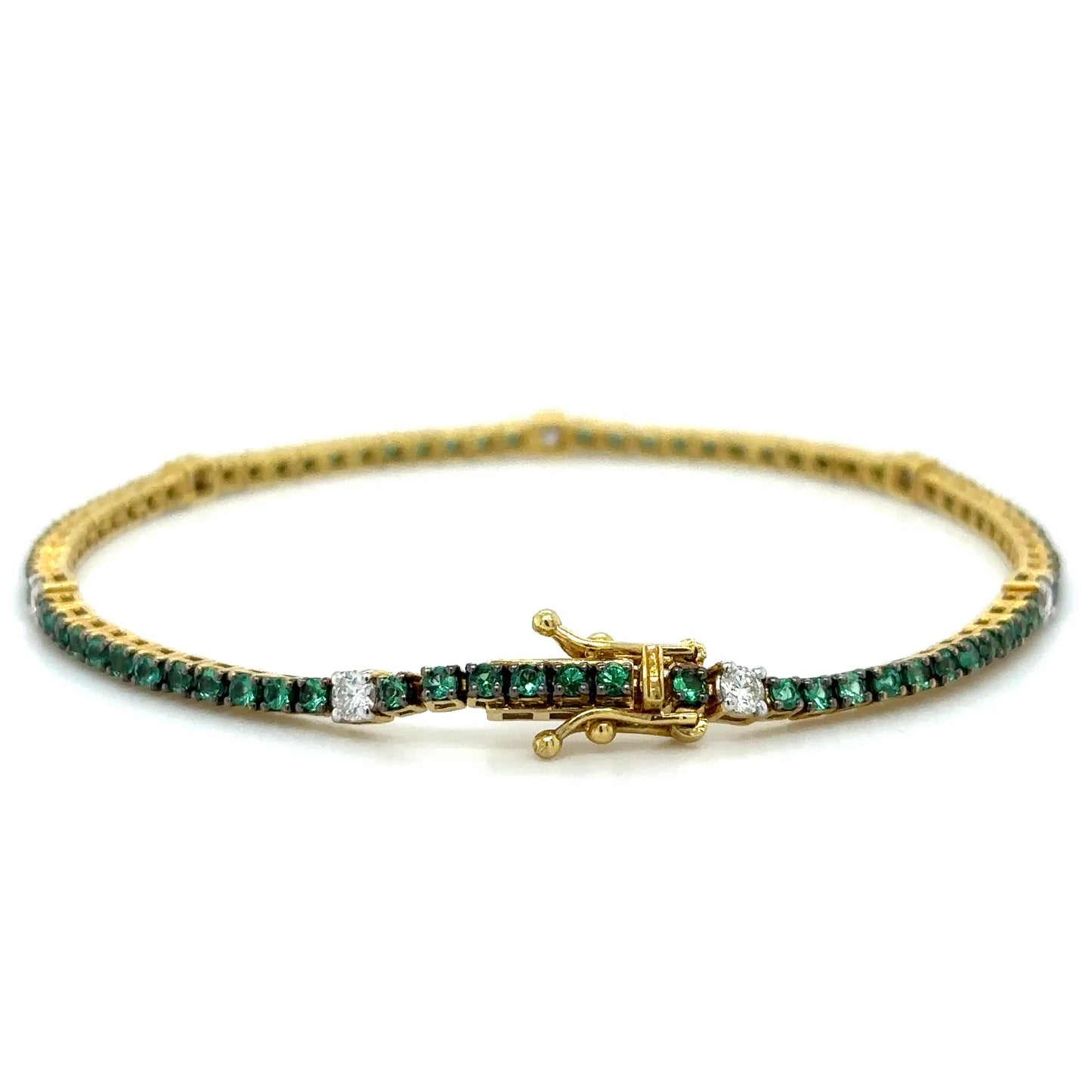 18K YELLOW GOLD EMERALD AND DIAMOND TENNIS BRACELET