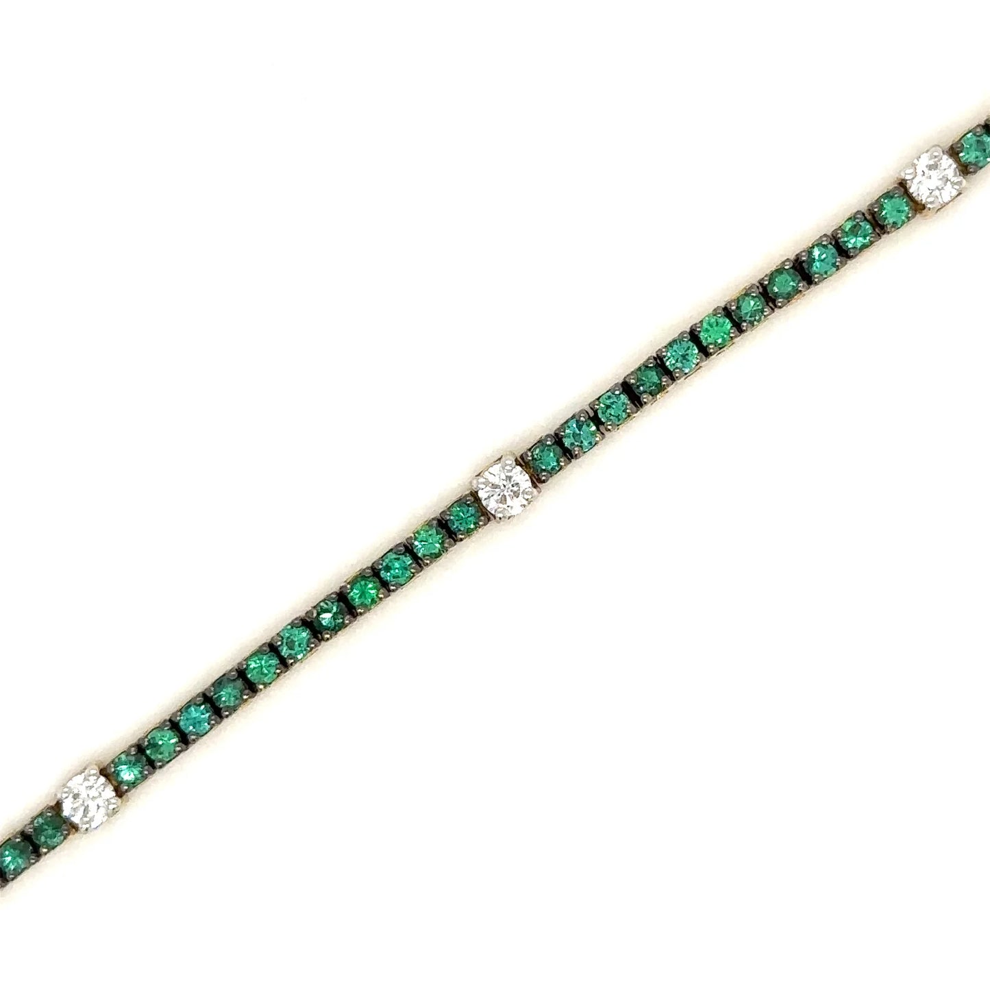 18K YELLOW GOLD EMERALD AND DIAMOND TENNIS BRACELET