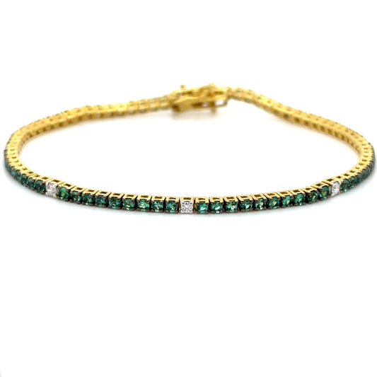 18K YELLOW GOLD EMERALD AND DIAMOND TENNIS BRACELET