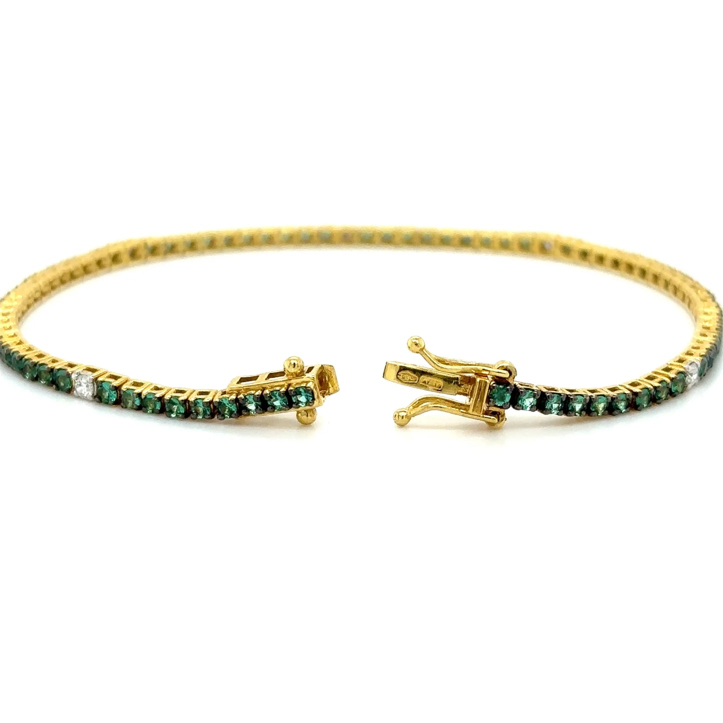 18K YELLOW GOLD EMERALD AND DIAMOND TENNIS BRACELET