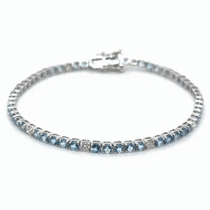 14KT WHITE GOLD BLUE AQUAMARINE AND WHITE DIAMOND TENNIS BRACELET