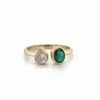 14KT YELLOW GOLD EMERALD AND DIAMOND RING
