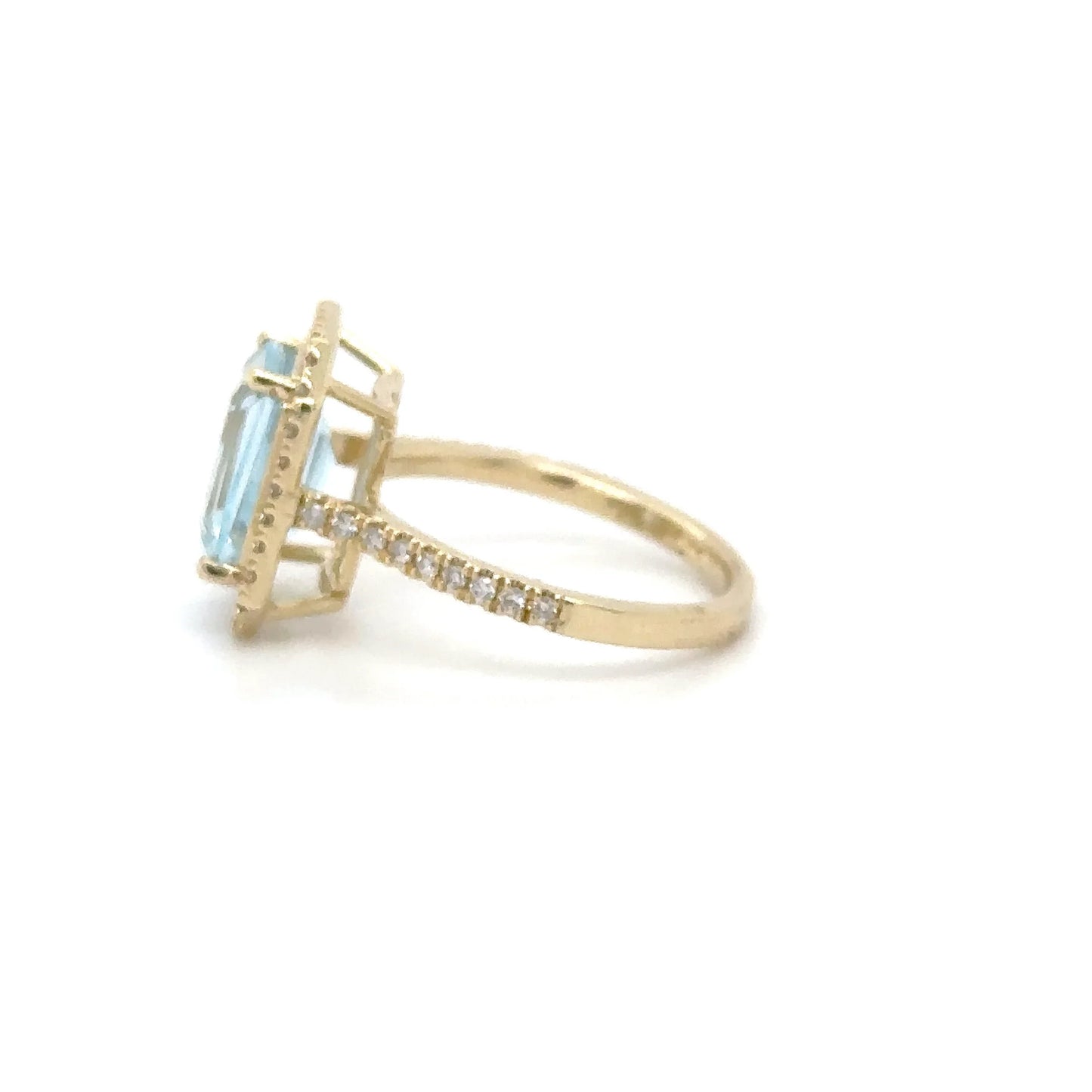 14KT YELLOW GOLD EMERALD SHAPE SKY BLUE TOPAZ AND DIAMONDS RING