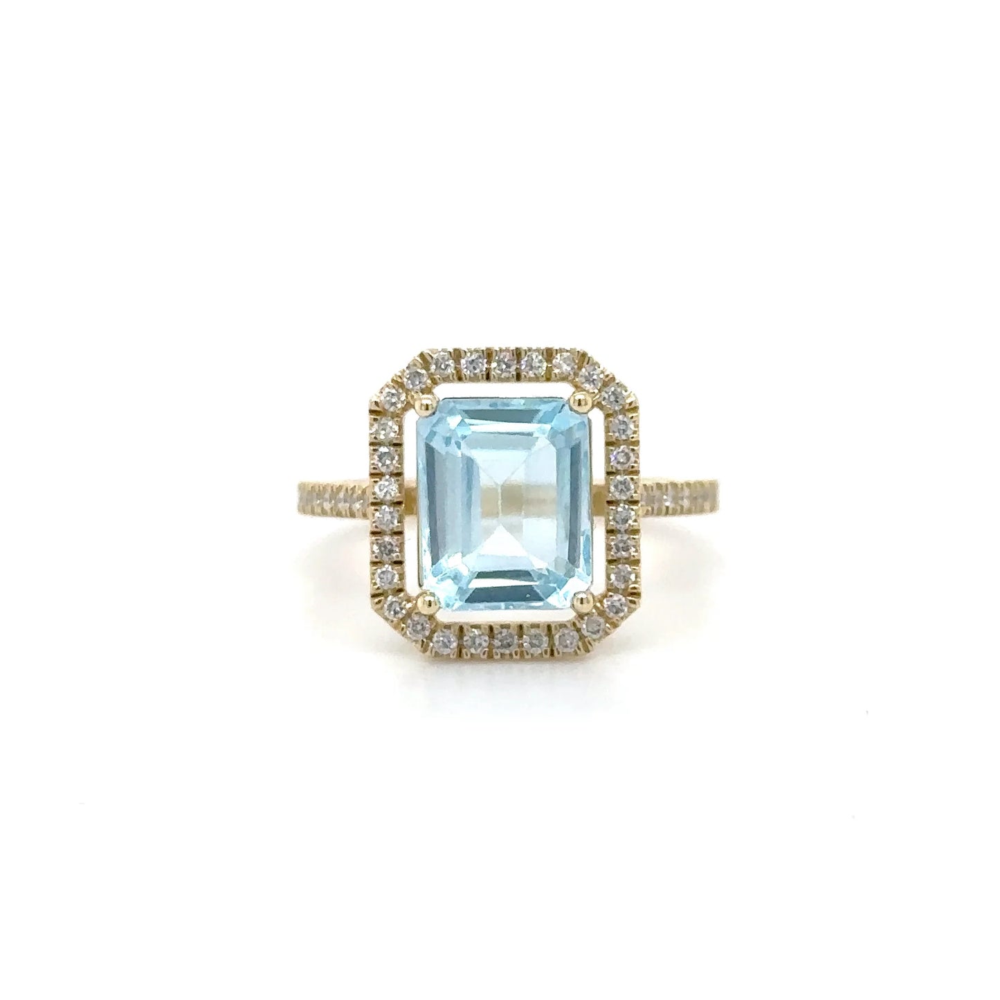 14KT YELLOW GOLD EMERALD SHAPE SKY BLUE TOPAZ AND DIAMONDS RING