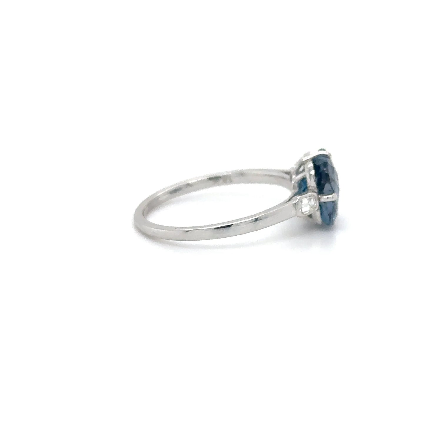 14KT WHITE GOLD BLUE TOPAZ AND DIAMONDS RING