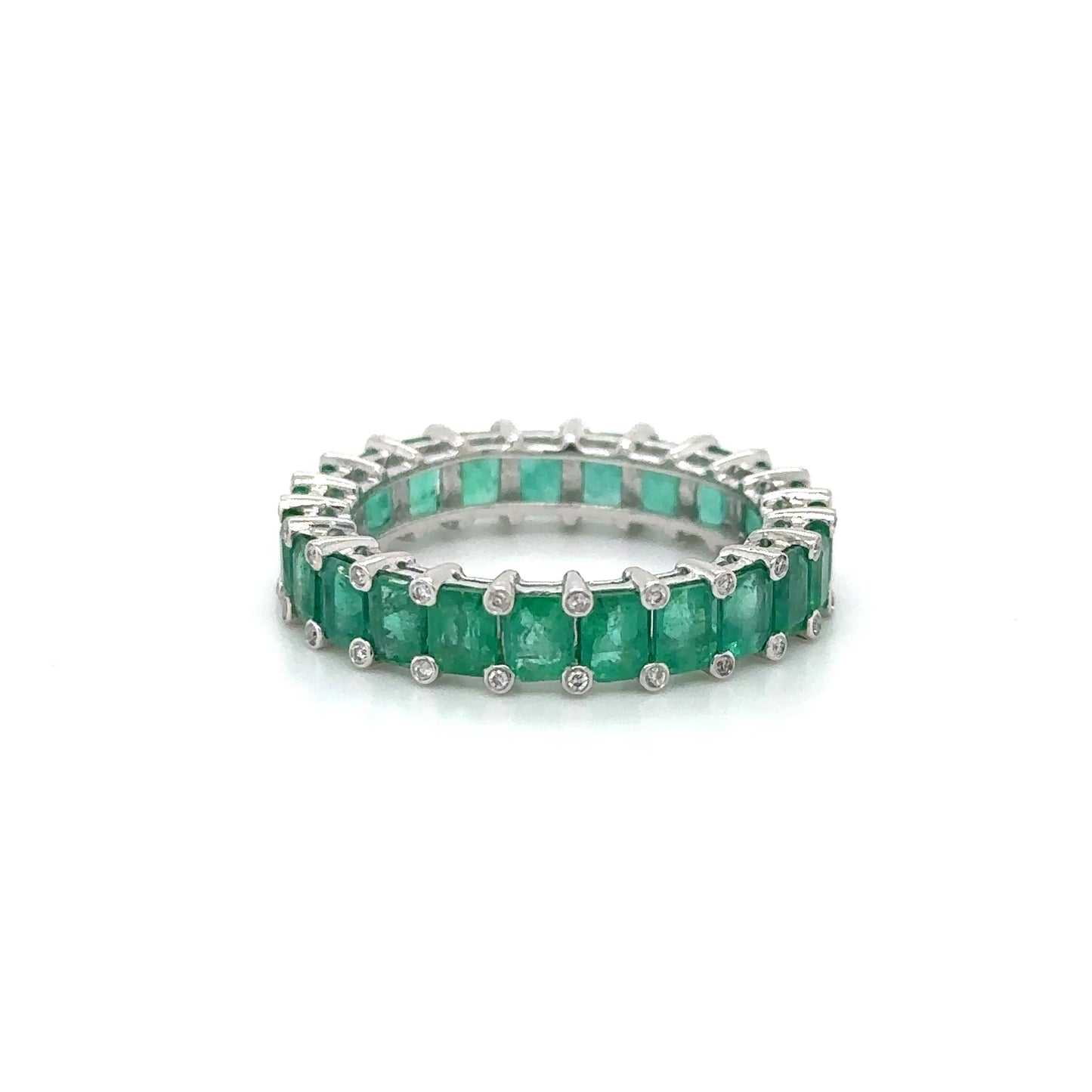 14KT WHITE GOLD EMERALD AND DIAMONDS RING