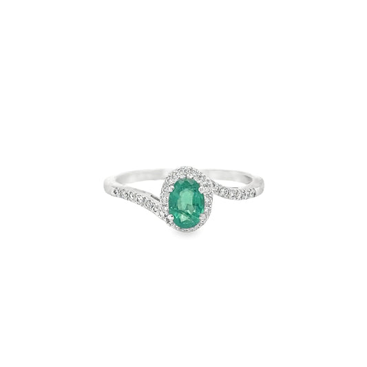 18KT WHITE GOLD EMERALD AND DIAMONDS RING