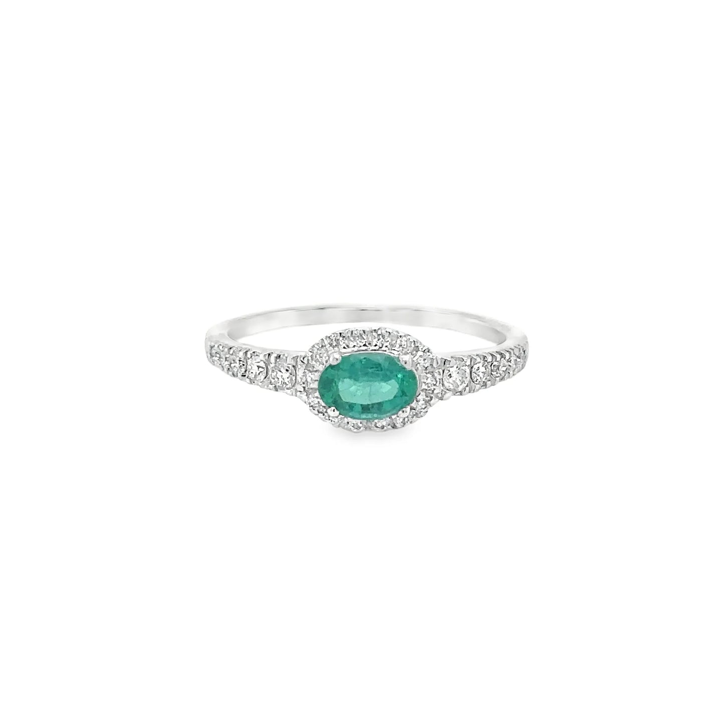 18KT WHITE GOLD EMERALD AND DIAMONDS RING
