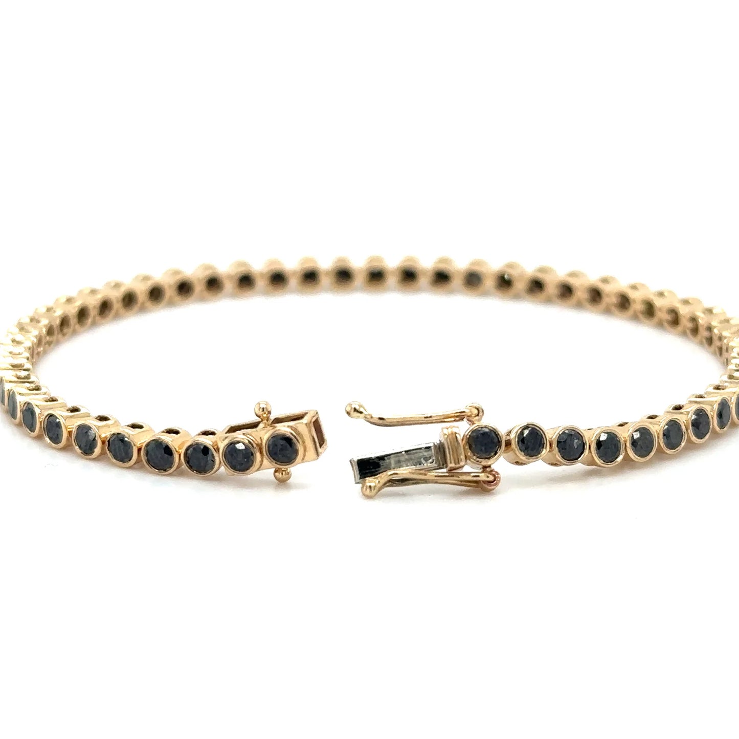 14KT YELLOW GOLD BLACK DIAMOND BEZEL TENNIS BRACELET