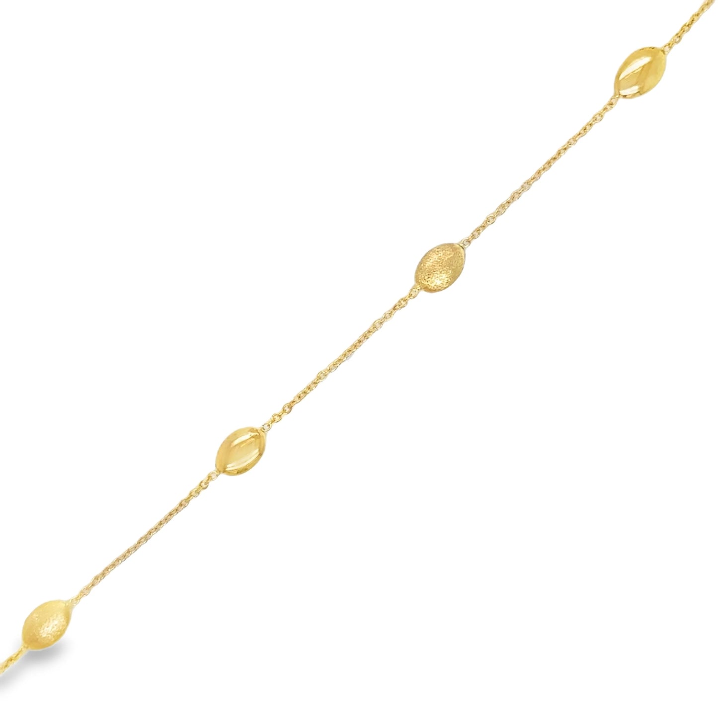 14KT GOLD BRACELET WITH OVAL STATION BEADS