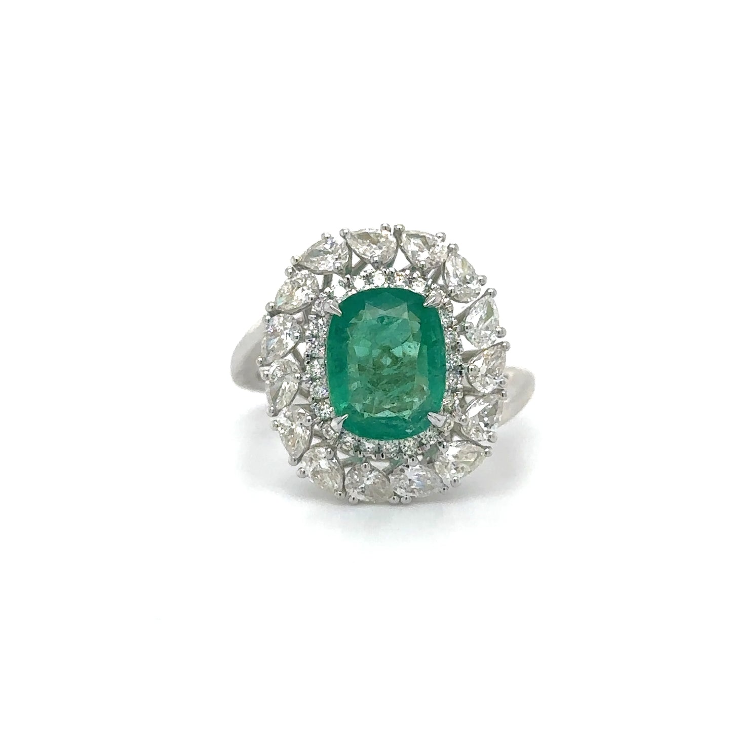 18KT WHITE GOLD EMERALD AND DIAMOND RING