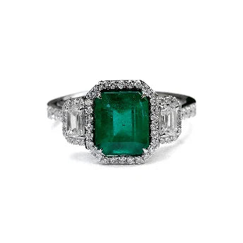 18KT WHITE GOLD EMERALD AND DIAMONDS RING