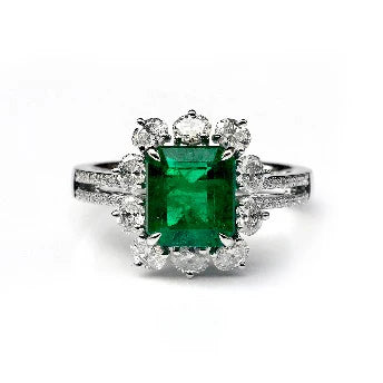18KT WHITE GOLD EMERALD AND DIAMONDS RING