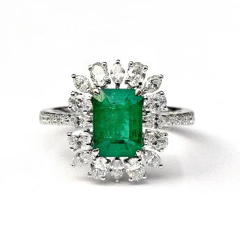 18KT WHITE GOLD EMERALD AND DIAMONDS RING