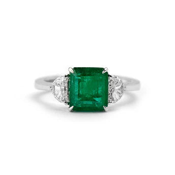 18KT WHITE GOLD EMERALD AND DIAMONDS RING