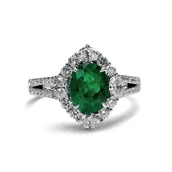 18KT WHITE GOLD EMERALD AND DIAMONDS RING