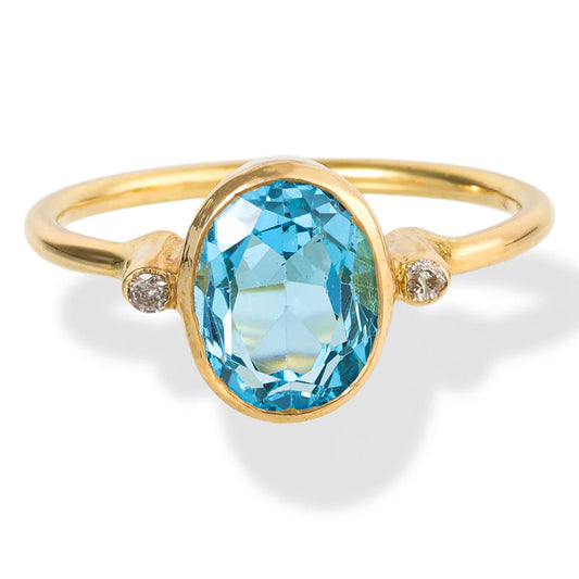 18KT YELLOW GOLD DIAMOND AND BLUE TOPAZ OVAL SHAPE RING