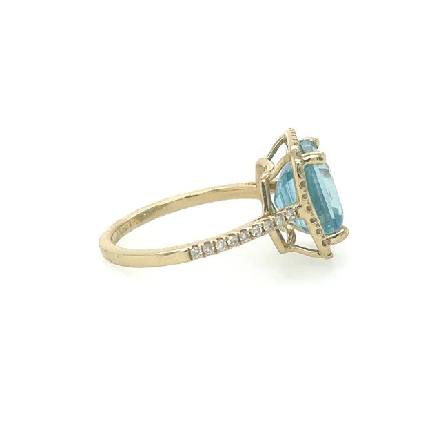14KT YELLOW GOLD DIAMONDS AND BLUE ZIRCON RING