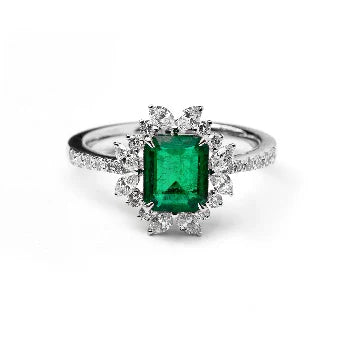 18KT WHITE GOLD EMERALD AND DIAMONDS RING