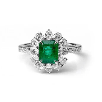 18KT WHITE GOLD EMERALD AND DIAMONDS RING